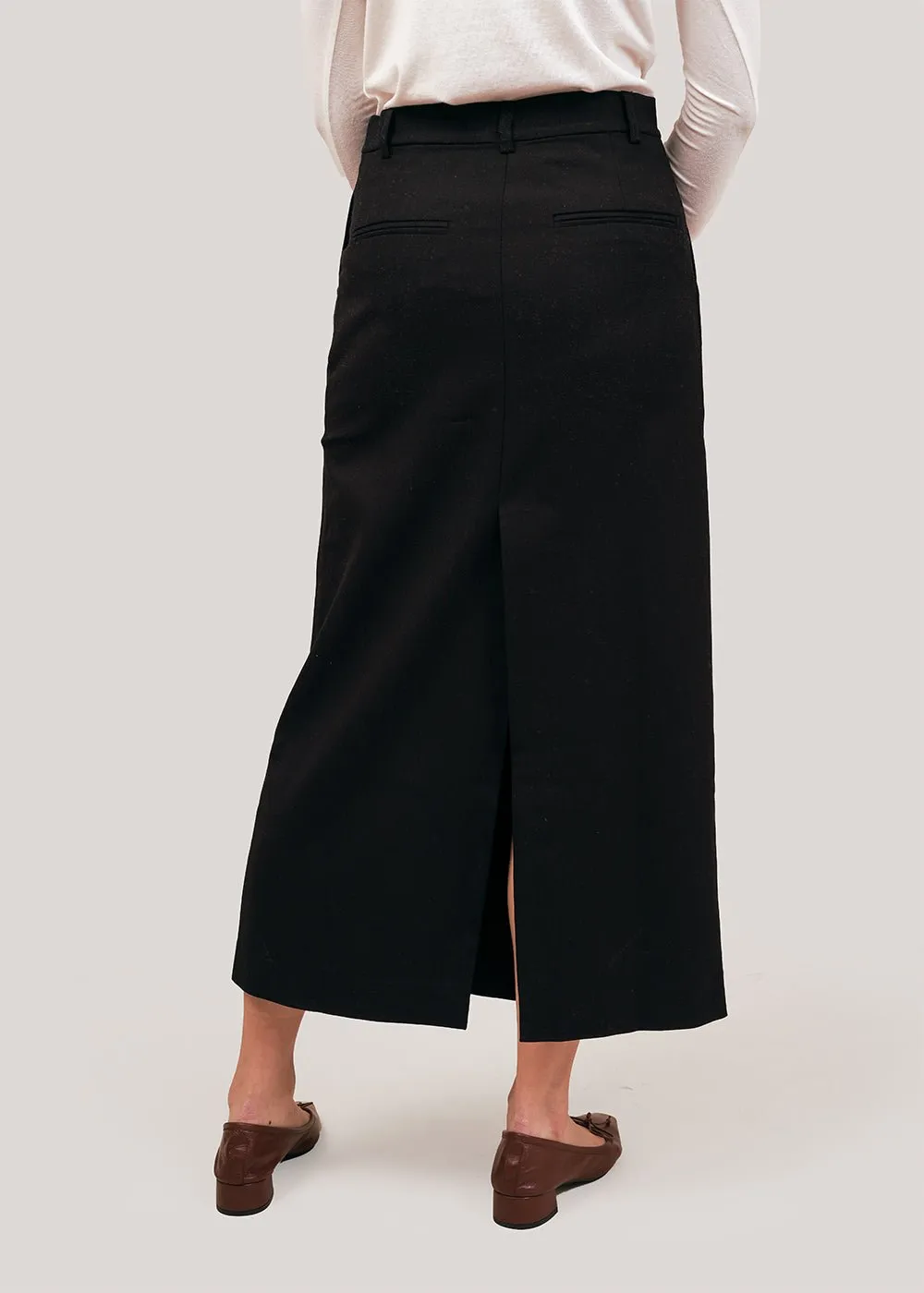 Black Wool Blend Midi Skirt: Wool Blend Black Skirt, Mid-length, SEO-friendly.