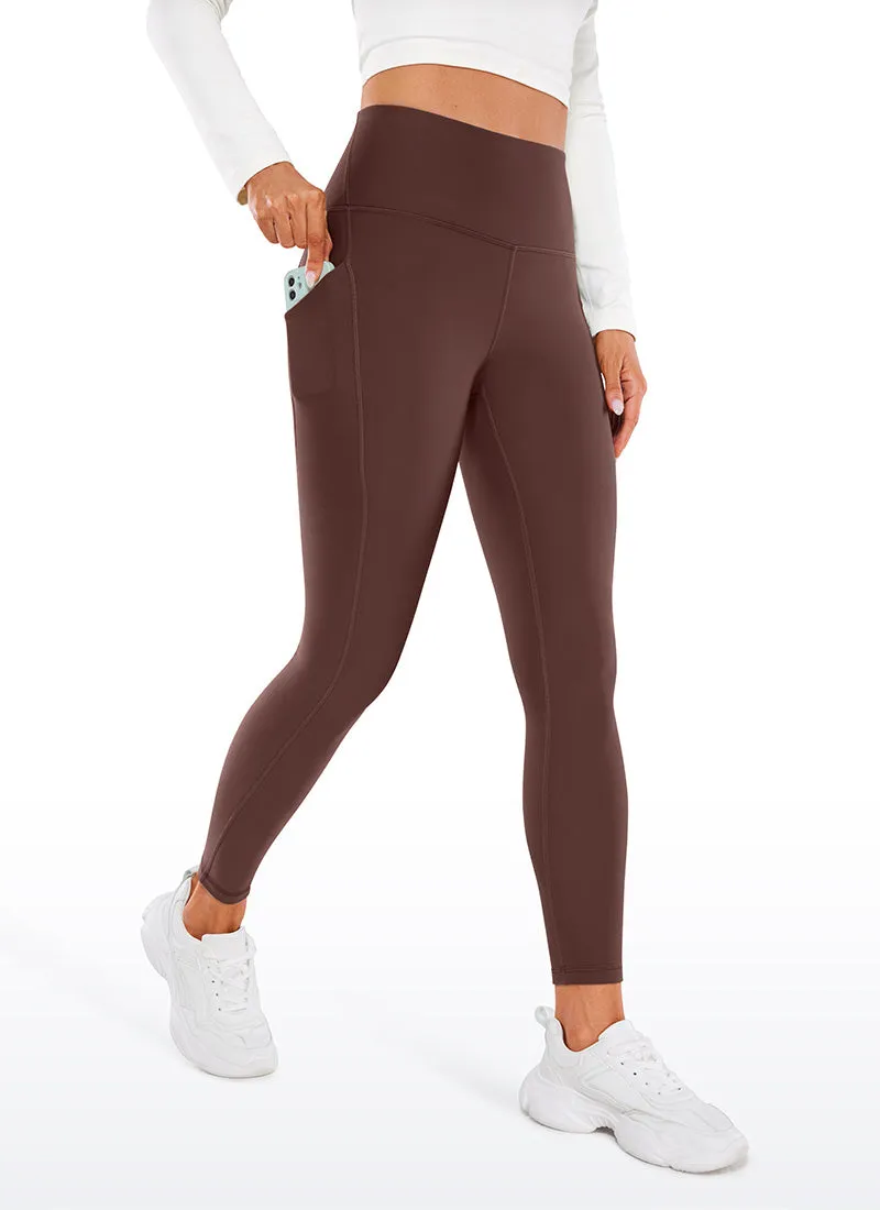 Fleece-lined leggings with soft pockets, 26.5-inch.