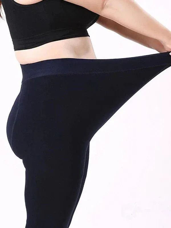 Winter women's fleece-lined leggings with side pockets.